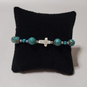 Green Elastic Beaded Bracelet With Cross Charm